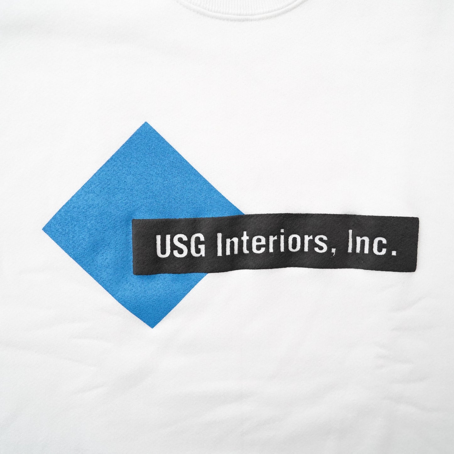Lee USG Interiors, Inc. sweat