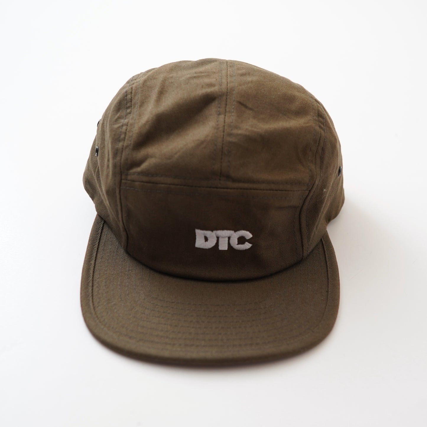 "DTC" cap